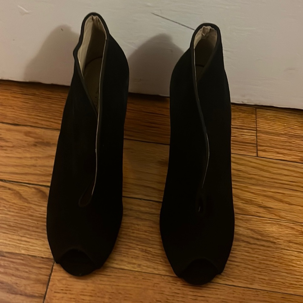 Peep toe heels with unique silhouette